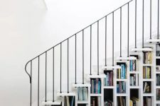 32 a white staircase that acts as a bookcase is all you need to save a lot of space in your home and show off your book collection