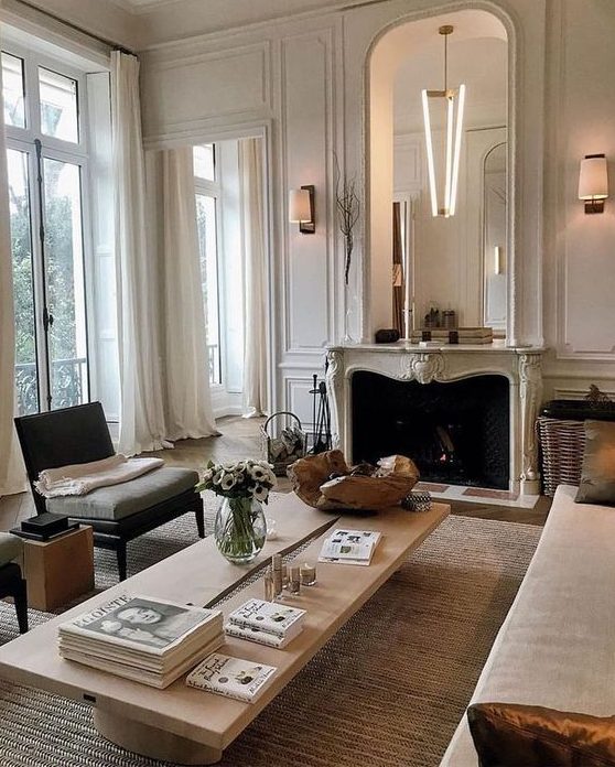 a French style living room done in neutrals - off-white, ocher, light greys and jsut some touches of dark shades
