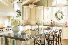 a gorgeous green kitchen design in farmhouse style