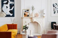 a more contemporary version of a fireplace matches the mid-century modern French chic living room