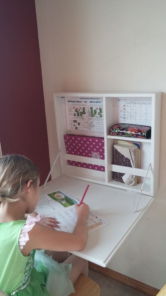 a small wall-mounted Murphy desk is a nice solution for a tiny kid's room, here your kid will be able to draw, craft and study