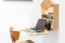 a small working space with a tony Murphy desk, a built-in lamp, a matching plywood chair is all you need for working