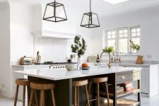 a stylish farmhouse kitchen with white shaker cabinets, white stone countertops, a black kitchen island with drawers and open shelves