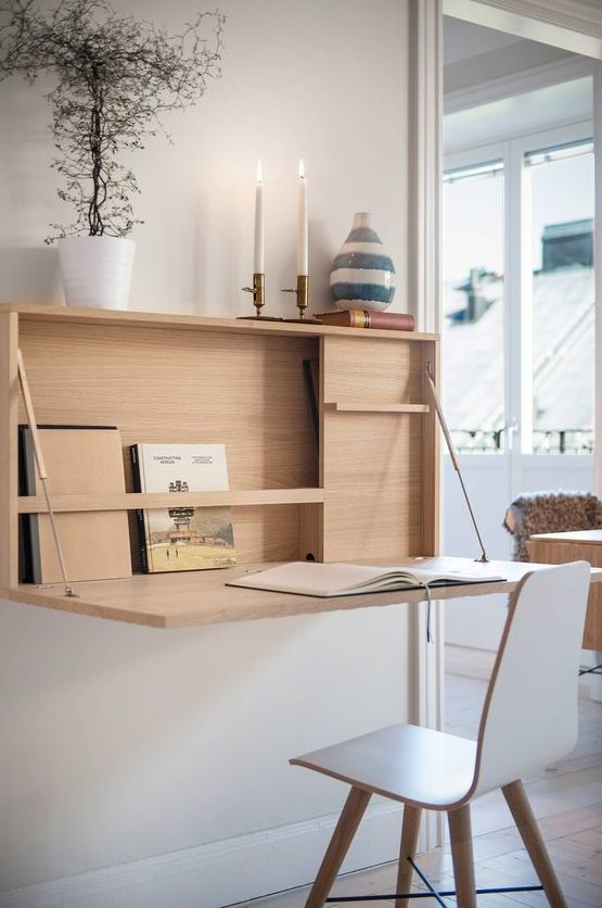 an elegant contemporary Murphy desk with some storage space and a comfy tabletop for a cozy working nook