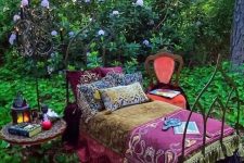 02 a forged boho daybed placed right in the garden to create a relaxation oasis outdoors, place some citronella candles to keep the bugs away