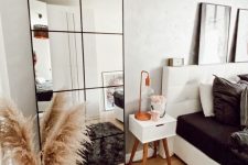 07 an IKEA mirror hack with frames can take a blank wall and make your space look bigger plus you may use it for composing outfits