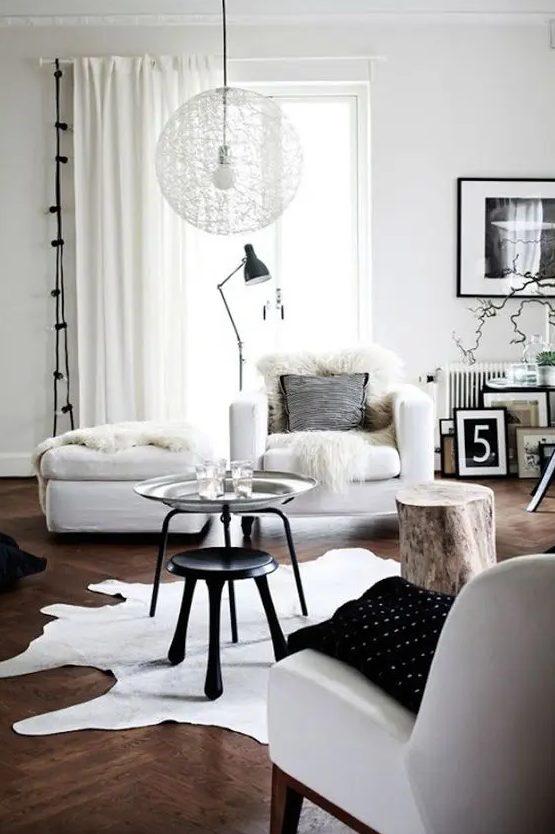 a faux sheepskin, faux fur and leather are ideal to make Scandinavian spaces catchier and cozier