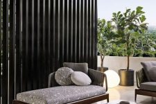 13 a modern dark stained outdoor daybed looks elegant and simple and will work for many outdoor spaces