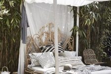 15 an exquisite carved wooden daybed with a canopy is amazing for a tropical or boho retreat
