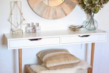 16 a stylish console made of IKEA items and a stool plus a wood clad mirror over it for a modern farmhouse space