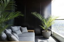 19 a stylish contemporary outdoor daybed with a grey mattrress and matching pillows is a chic idea for a laconic space