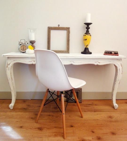 a vintage white half console table with beautiful vintage decor and a white chair won't take much space, and it can be used as a desk, too