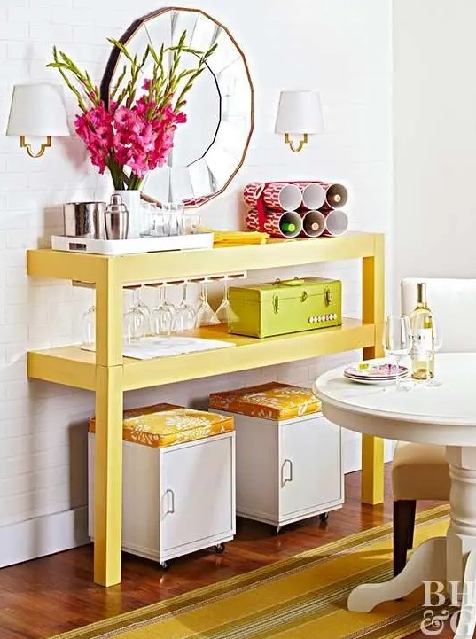 a colorful buffet made of a cut table painted bright yellow, with matching ottomans is a cool idea for a small dining or living room