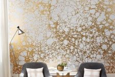 26 a printed gold and white wallpaper wall will make your living room very bold and stylish