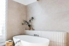 a cozy neutral bathroom design