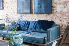 a living room with a stylish brick wall