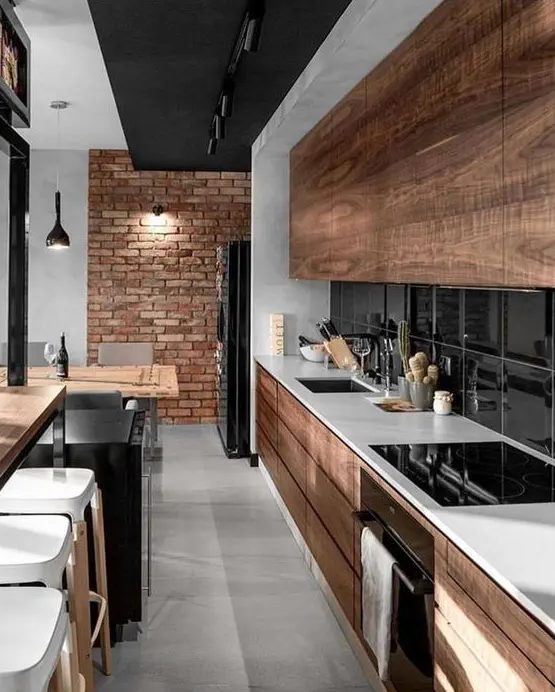 a cozy modern kitchen with rustic details and touches incorporated there, and an industrial brick wall