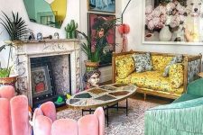 a maximalist living room with a yellow printed sofa, pink chairs and a green fringe sofa, bold artworks and a catchy mirror