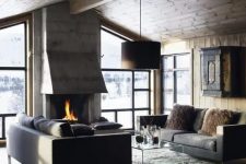 a modern chalet is an ideal example of a modern rustic space, done with wood, fur and stone