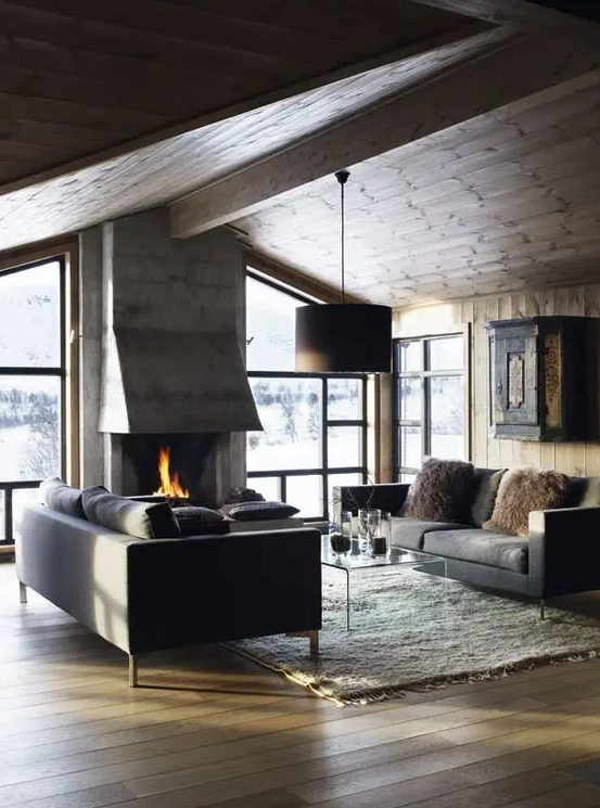 a modern chalet is an ideal example of a modern rustic space, done with wood, fur and stone