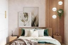 a pretty contemporary bedroom in neutrals, with a wooden slab accent, a floating bed with neutral bedding, a sleek storage unit that takes a whole wall and a cluster of pendant lamps