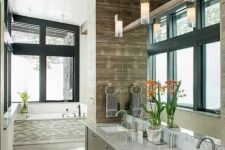 even bathrooms in a modern rustic home should feature large windows to fill it with light