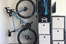 02 a bike rack attached to a storage unit is a smart idea to show off your bike and to store it inside your home