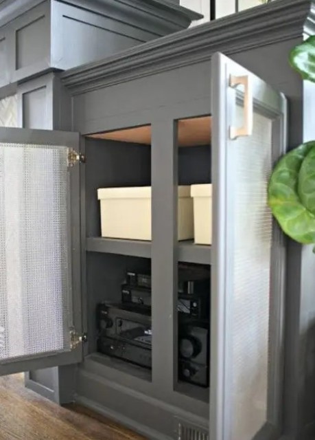 a cabinet with cane doors will hide your wi-fi router without blocking the signal, which is extremely important