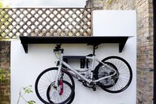 19 an outdoor shelf and an additional shelf to store your bikes outdoors – this idea can be applied to indoors, too