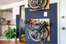 20 creative plywood holders that hold folded bikes are a cool idea for any space, they won’t let your display but they won’t take any floor space