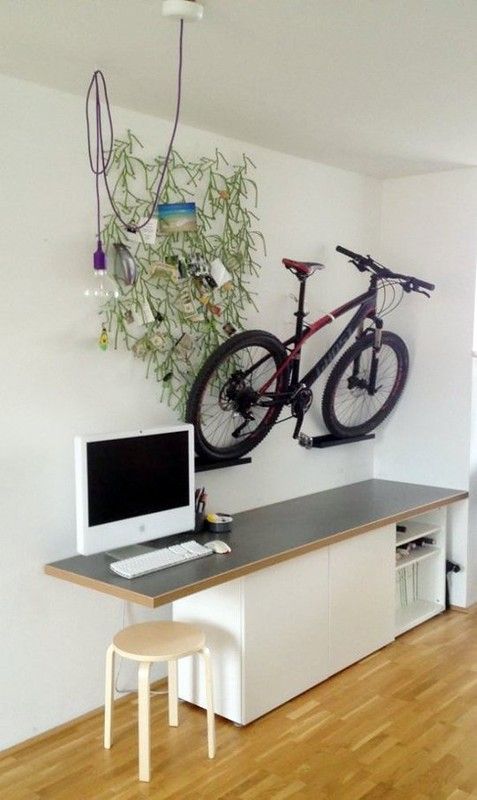 IKEA Ribba ledges attached to the wall is a lovely and very easy idea to store your bike and display it at the same time