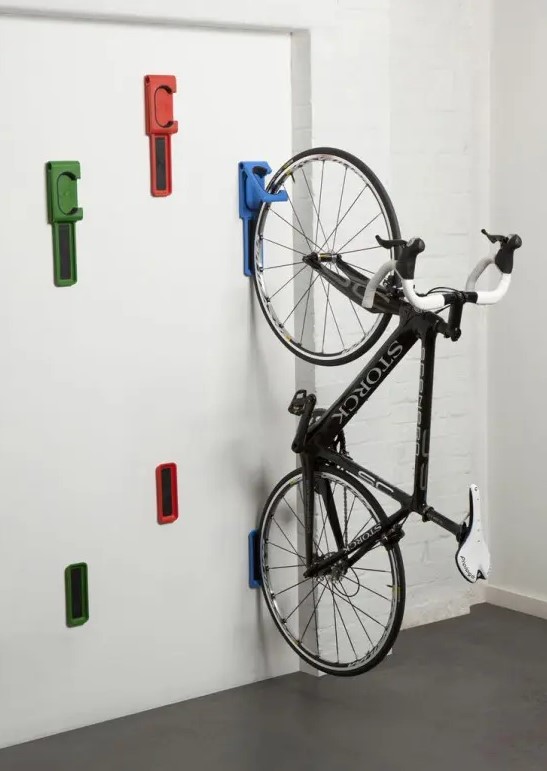 special colorful holders for bikes are a great bright accent and a creative way to store your bike with style