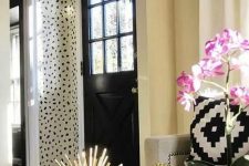 32 a beautiful entryway accented with Dolmatin wallpaper, which is a bold and out of the box idea to rock, add pattern to the space