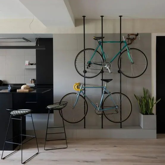 metal slabs are great to hold your bikes and they look stylish and cool and integrate them into the interior in a lovely way