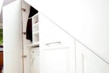 a built-in laundry space under the stairs with much storage for the things is a lovely idea for a staircase – use this awkward nook to advantage