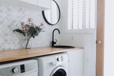 a small laundry room design