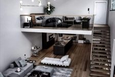 a stylish contemporary apartment with a monochromatic color scheme, a loft bedroom and a living-dining space down the stairs