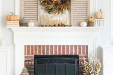 11 lovely rustic decor with a red brick fireplace, a vintage mantel, faux pumpkins, a lush grass and nut wreath and stained shutters