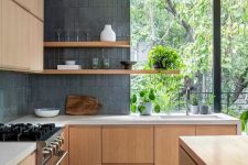 a lovely kitchen backsplash made of stacked tiles