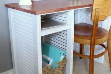 19 a desk made of repurposed shutters, with a stained tabletop and a basket for storage is a lovely idea for a rustic or seaside space