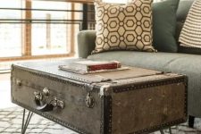 20 a vintage suitcase placed on hairpin legs is a very beautiful side table with plenty of storage space