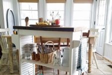 a cool mobile kitchen island made of old shutters