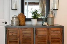 23 a pretty and stylish rustic console cabinet of metal and with shutter doors is a cool and chic idea and it’s not very difficult to DIY