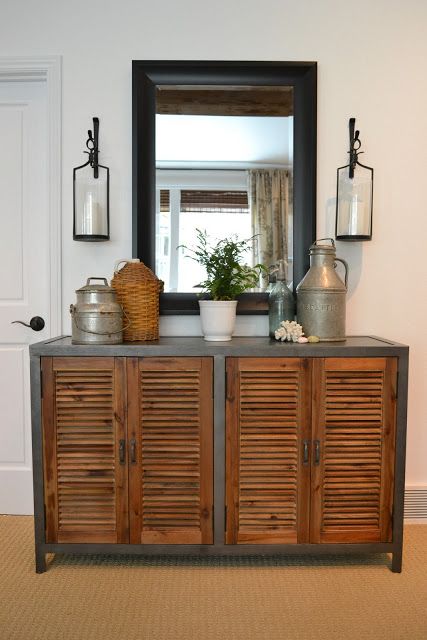 a pretty and stylish rustic console cabinet of metal and with shutter doors is a cool and chic idea and it's not very difficult to DIY