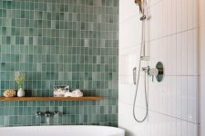 27 a bold contemproary bathroom with skinny white and mismatching green skinny tiles plus a grey mosaic tile floor
