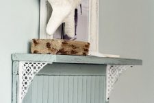 28 a seafoam shutter with hooks and some seaside decor on top is a lovely shelf and rack for a seaside space or a coastal one