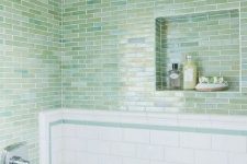 44 green blue skinny tiles clad horizontally paired with white subway tiles make up a stylish look