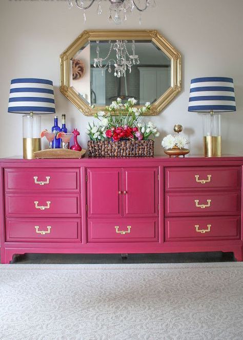 a bold pink vintage dresser will be a bold addition of color and a cool storage unit in a neutral or colorful space