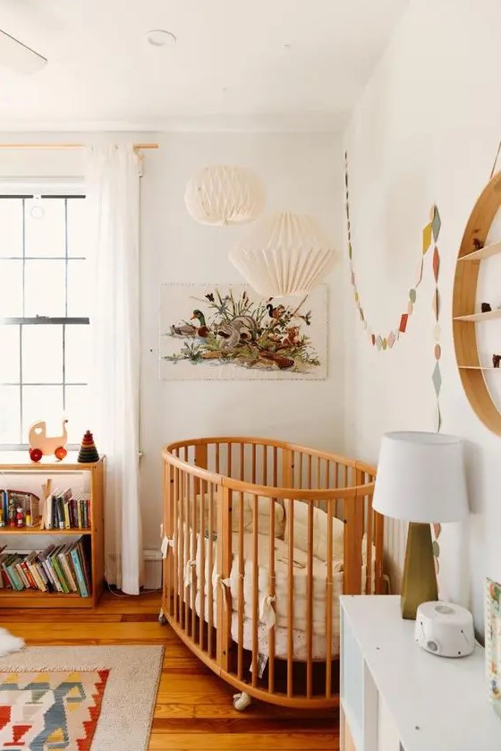 a cozy nursery with colorful touches