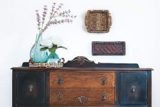 a fab stained and black vintage dresser with vintage handles, turquoise vases, some woven trays is a beautiful idea for a rustic space